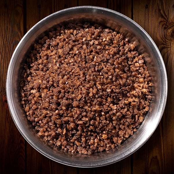 Coffee infused flavored finishing flake salt in a circular metal container